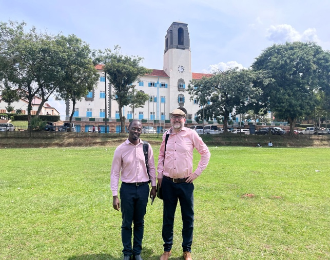 Dr. Samuel Kirimunda, and Prof. Samuel Flores at the iconic Main Building of Makerere University